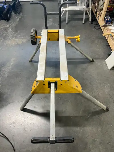 I'm selling a DeWalt miter saw stand, perfect for any jobsite or workshop. It's used but in good con...