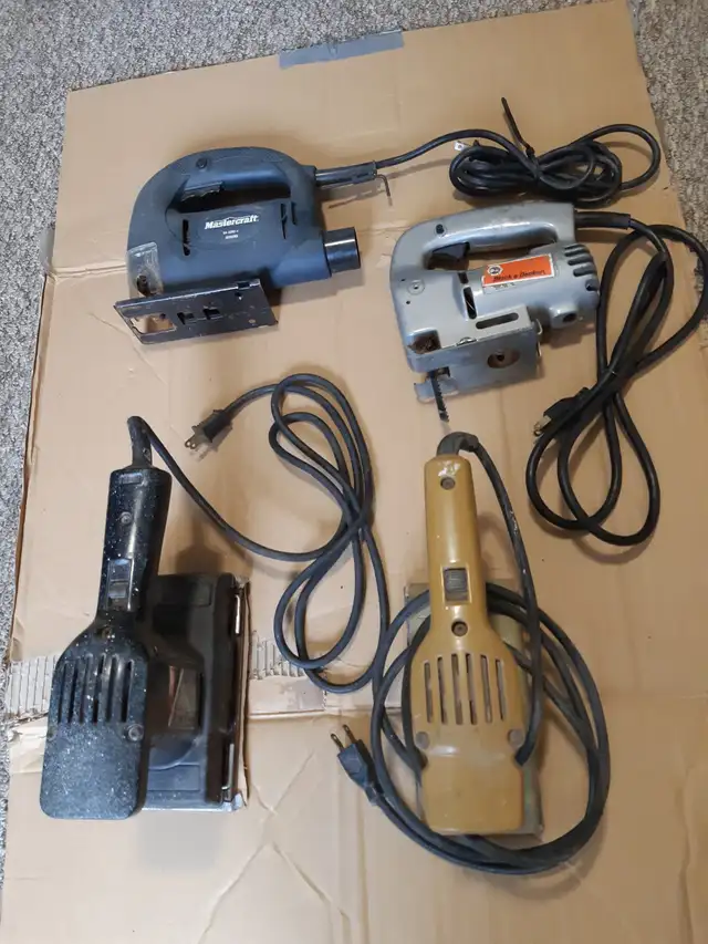 two palm sanders and two jig saws62863730978819128