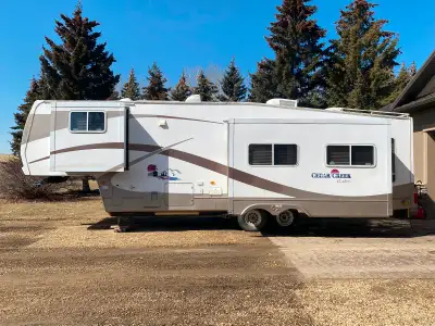 2008 Cedar Creek 34’ 5th wheel. These trailers are built very durable. Older unit but well kept, has...