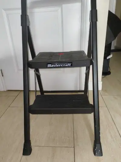 This Mastercraft two-step ladder is ideal for various tasks around the house, providing a safe and c...