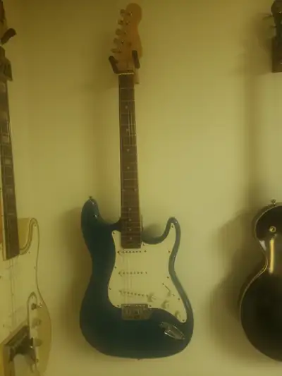 Stratocaster-style starter guitar, View more
