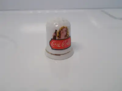 2 dés en porcelaine de la cie Coca-Cola 5.00$ chacun