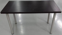 IKEA BLACK TOP TABLE WITH 4 STEEL LEGS.