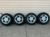 Lightly used Pirelli Ice Zero tires - 195/65 R15 on rims