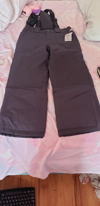Kids snow pants. New unused with tags. Size 7-8