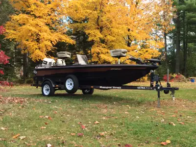 1989 Ranger 320V Comanche 16' Bass Boat with a 110HP Johnson 2 Live Wells and Port Side Rod Locker 2...