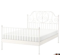 Beautiful white bed frame without mattress 