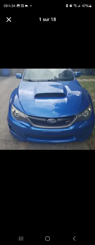 À vendre, une Subaru Impreza WRX 2011 bleue, une voiture de performance avec un moteur turbo et une...