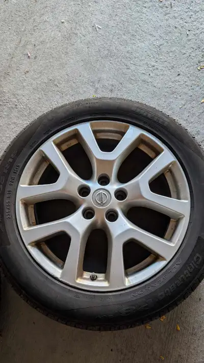 All season tires with rims, were mounted on a Nissan Rogue 2011. Profile 225 \ 55 R18. The tires wer...