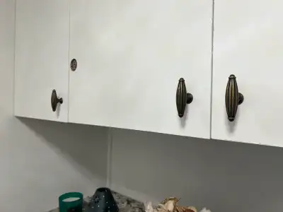 Spruce up your kitchen cabinets with these stylish handles! These are used cabinet handles with a br...