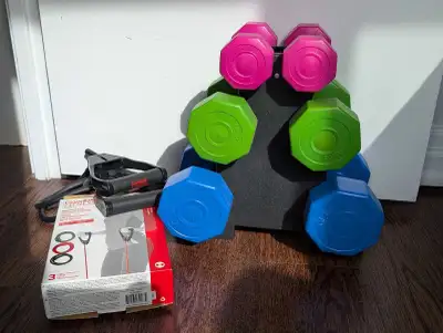 Get ready to pump some iron with this vibrant weight set, complete with a resistance workout set to...