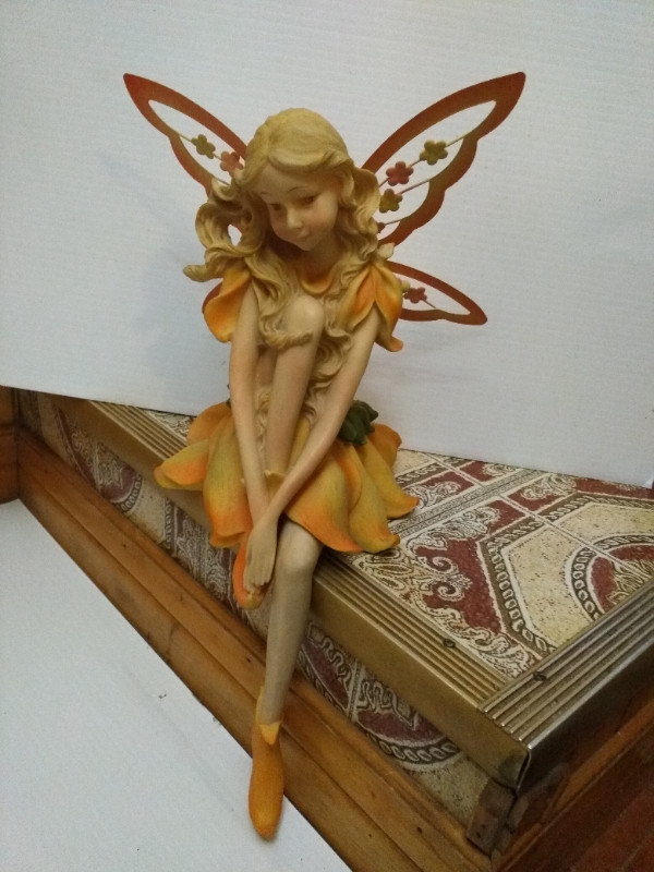 Garden Fairy 16" tall sits on shelf in Outdoor Décor in Cambridge