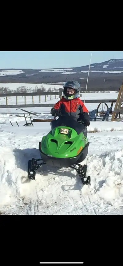 2016 Arctic Cat ZR120. Great shape other than the dog ate the seat. Kids are too big to ride now.