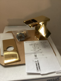 Gold waterfall bathroom faucet with light - new in box.  Tempera