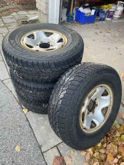 winter tires mounted on rims. rims included. last used last winter on Toyota Tacoma