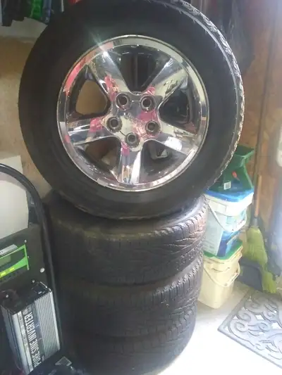 Selling a set of 5 vintage "Rogue" OEM Jeep Grand Cherokee wheels with 4 Goodyear Fortera tires 235/...