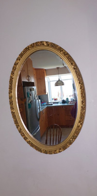 Gorgeous vintage mirror in ornate plastic 26 by 18 " frame