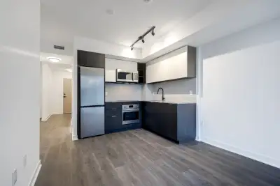 Discover comfortable and modern living in this spacious 600 Sq. Ft. 1 Bedroom + Den condo in a sough...