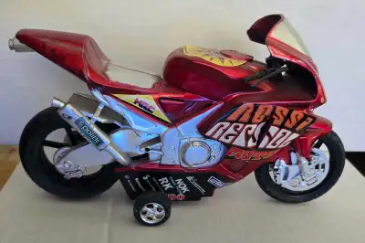 This Rossi Replicas Motorcycle is a neat little toy. It has definitely been played with, as you can...