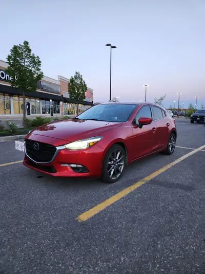 2018 Mazda 3 GT Premium Package with 160,000 km. Very rare fully loaded Mazda 3 with 6 speed manual...
