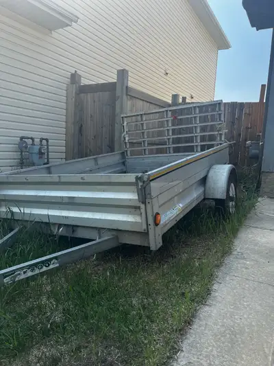 This is a Marathon utility trailer, ready to haul your gear! It is used, but in good working conditi...