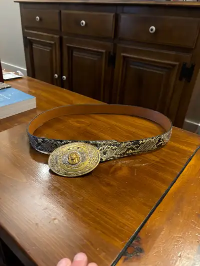 Mens size 42 Rattle snake skin belt for sale .Buckle is silver plated on jewlery bronze . Will let g...