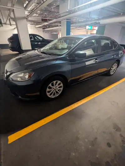 2016 Nissan Sentra SV in Graphite Blue for sale as-is. Well maintained, new mats placed last month....