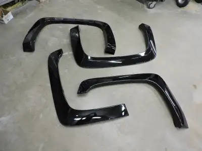 OE style fender flares that were sanded, primed and painted black by professional body shop. Fit 200...