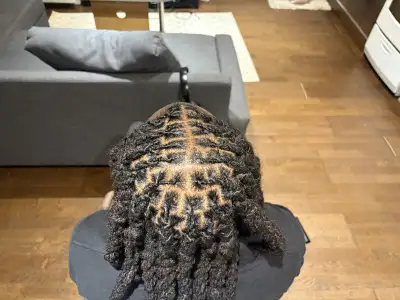 Proffessional loctician and hairstylist , View more