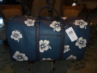 COACH LEATHER FLORAL ALOHA TRAVEL BAG NEW CONDITION