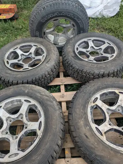 4 hercules avalance x-treme 215/70r15 on gm rims used about a month, and one spare $600.00