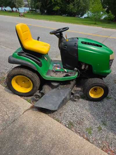 John Deere Riding lawn mower, View more