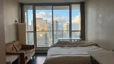 Located in the heart of Metrotown in Burnaby, one master bedroom on the 21st floor of a high-rise co...