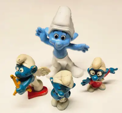 4 vintage Smurfs figures Manufactured by Bully, licensed by Peyo 3 small size include Brainy, Bashfu...