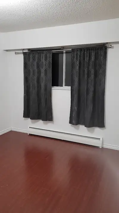 Two bedroom and large den on top floor of a well-located building with private entrance, second floo...