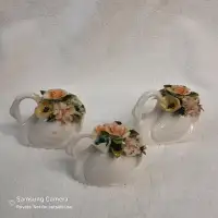 Vintage porcelain Flowers In Swan Figurines