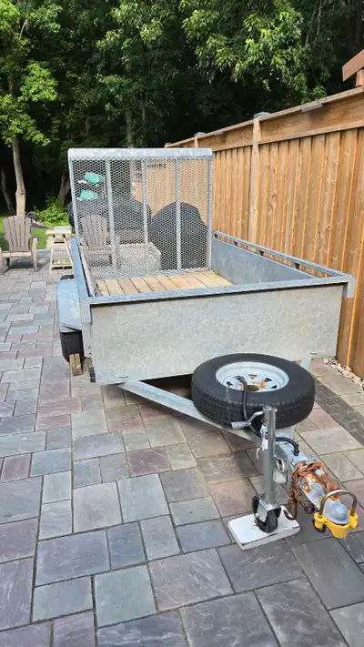 Fully galvanized 5x8 utility trailer. 2" coupler, 3500 lb axle, e-z lube hubs, all lights work. Exce...