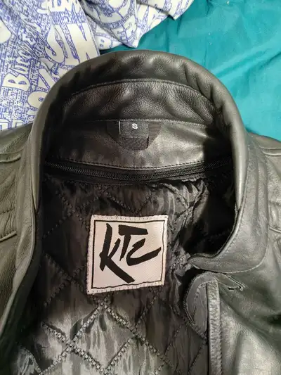 KTC Motorcycle Jacket with Skull details on front and back. Size Small. Buyer would need to collect...