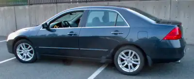 Nice V6 Honda Accord. Fully loaded with leather. Great running car that is driven daily. Does not bu...