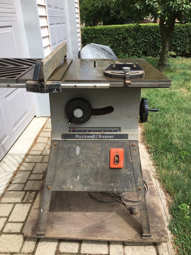 9” blade Table saw.  Cast iron top. Rockwell Beaver in Power Tools in Brantford - Image 2