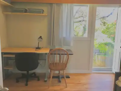 A room with a French door to the large backyard filled with variety fruit trees is available now. Lo...