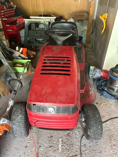 Toro 15-38 HXL Riding Mower with Yard Commander Dump Cart, View more