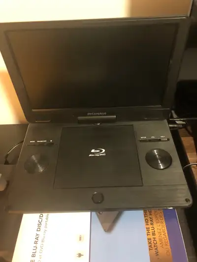 Sylvania Portable Blu-ray DVD player, Good for a car everything work has HDMI connectability headpho...