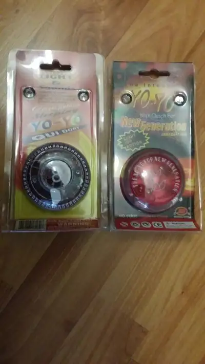 Collection of 2 Carded Vintage YO-YO'S..One Lights Up The Other Lights Up With Sound.Not Tested.I do...