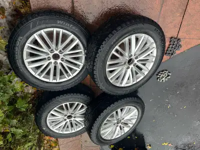 VW Tiguan 225/60 R 17 Hankook Winter I Pike Tires, mounted on original 7x17 ET 43 Volkswagen wheels....