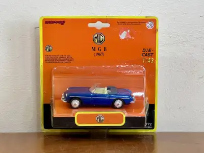1997 New-Ray 1:43 Diecast MG 1967 MGB, View more