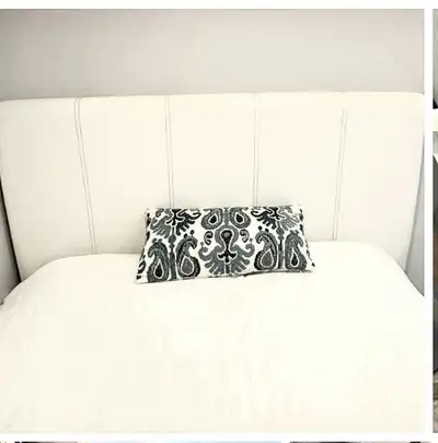 Queen size storage bed with leather headboard, View more