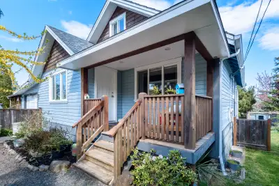 Charming 1936 Character Home with Mountain Views & Endless Potential Step into the warmth and charm...