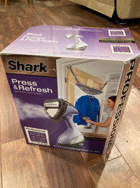 SHARK Portable Garment Steam Cleaning unit.  Only used once.
