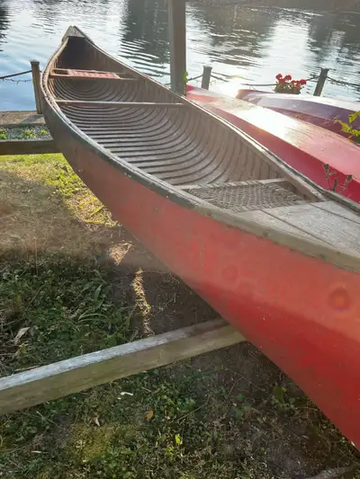 Cedar strip and Fiberglass Canoe 14’ long. Does not leak . Needs some tlc if you want . Can be used...